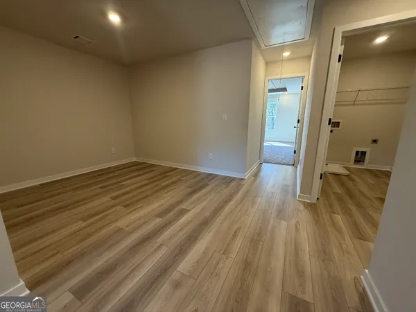 a view of empty room with windows