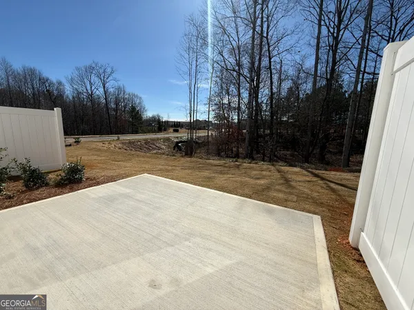 a front view of a house with large windows