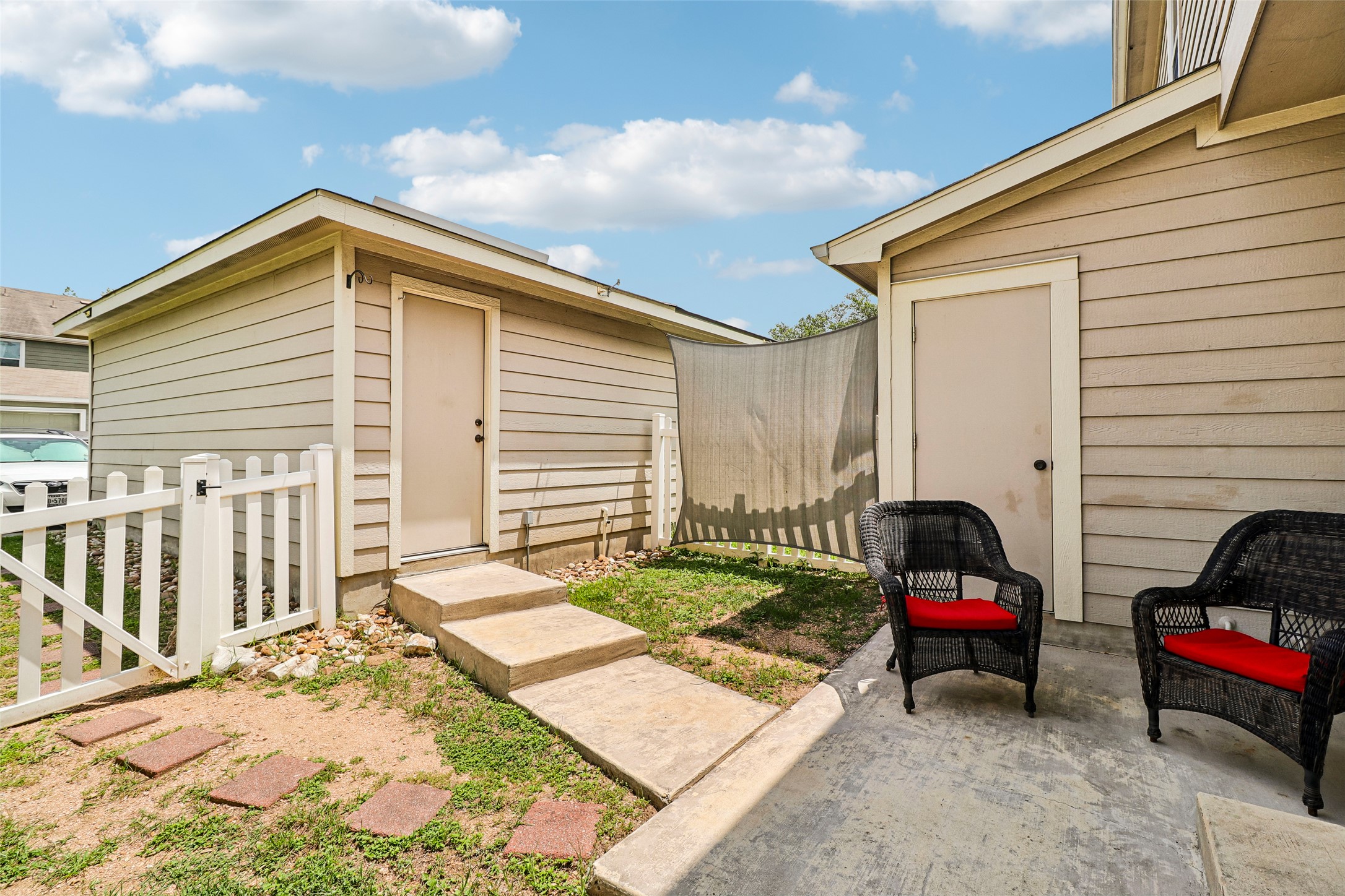 311 A Utterback Kyle, TX 78640 - Photo 30 of 40 a view of a house with a patio