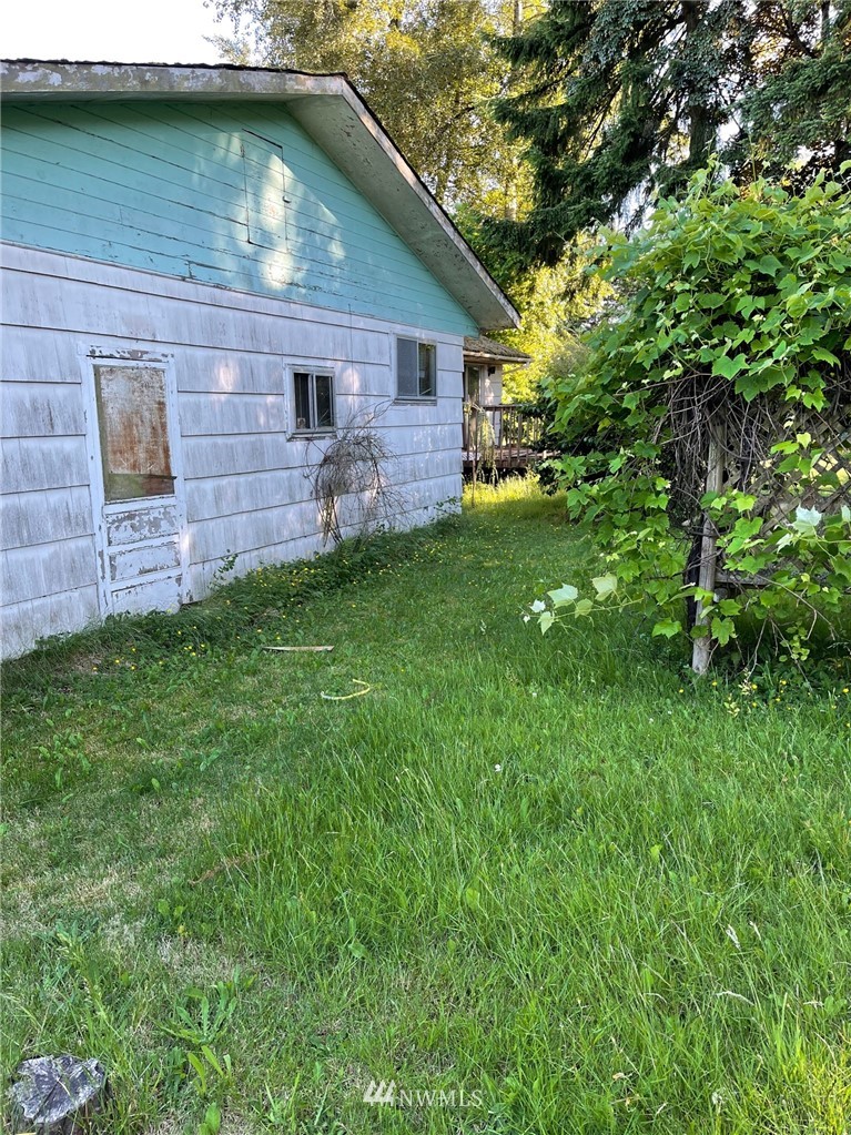 9530 Holly Drive Everett, WA 98204 - Photo 3 of 3 a front view of house with yard and green space