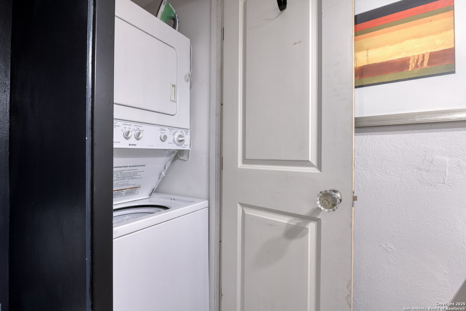 8715 Starcrest, Unit 58 San Antonio, TX 78217 - Photo 10 of 30 a utility room with dryer and washer