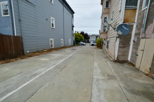 a view of a street with cars