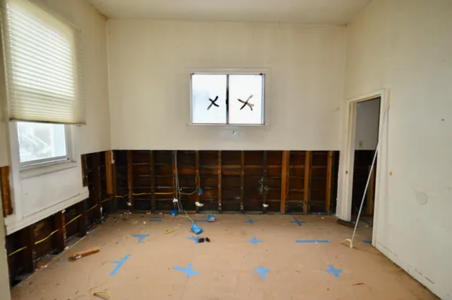 wooden floor and window in a room