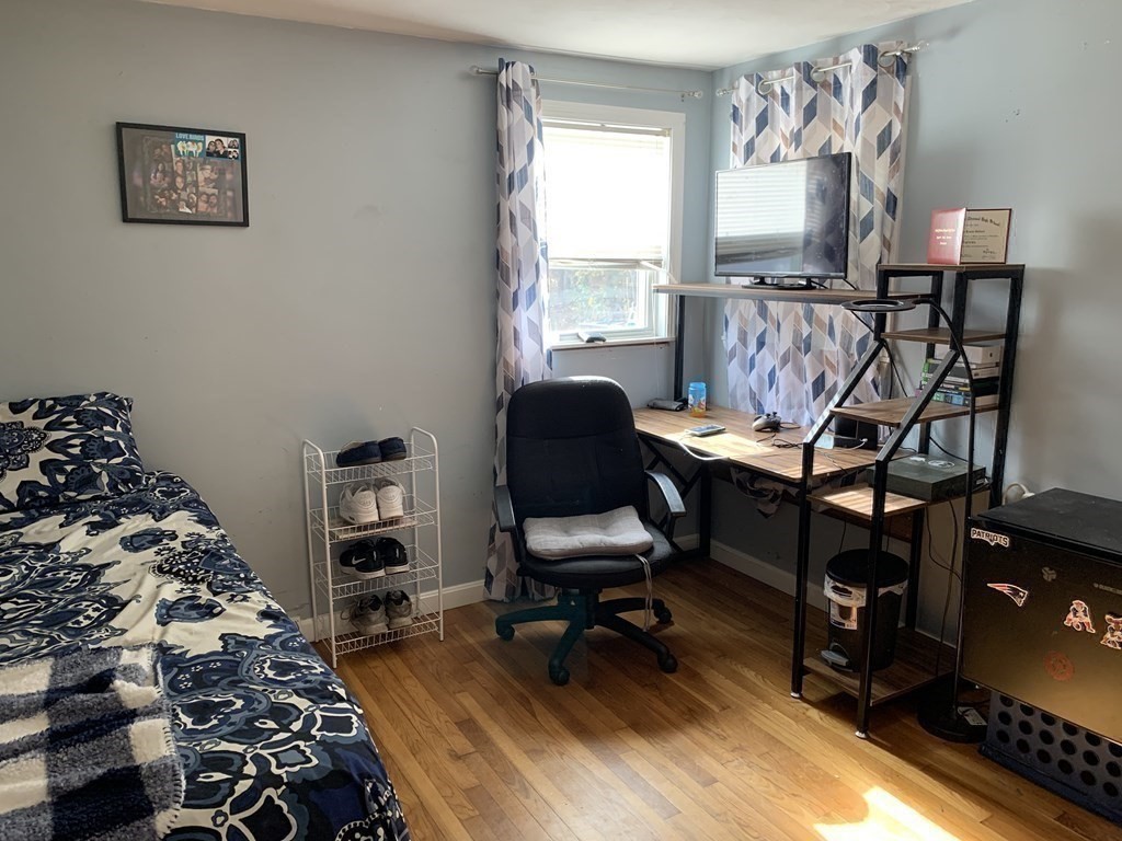 63 Lowell Road Pepperell, MA 01463 - Photo 14 of 32 a view of a workspace with furniture and a window