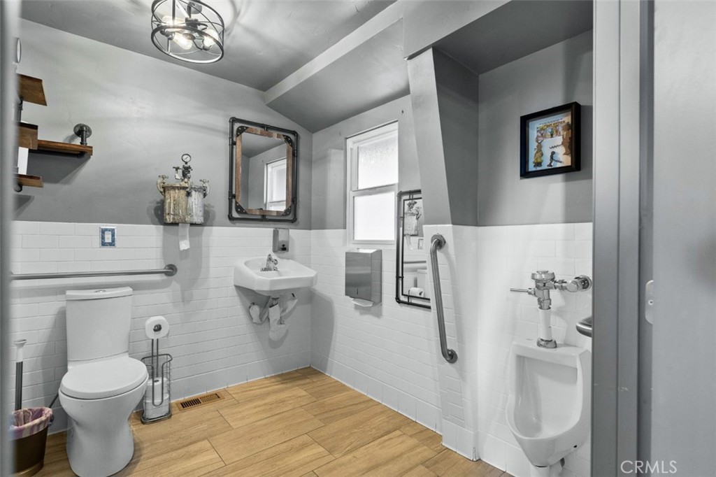 28670 Highway 18 Lake Arrowhead, CA 92385 - Photo 13 of 24 a bathroom with a toilet sink and mirror