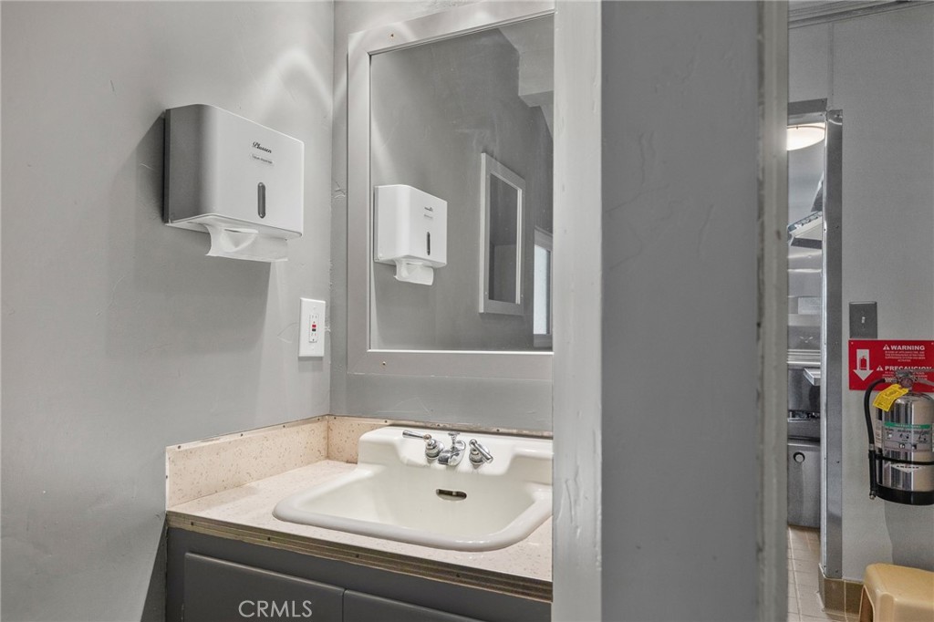 28670 Highway 18 Lake Arrowhead, CA 92385 - Photo 15 of 24 a bathroom with a sink and a mirror