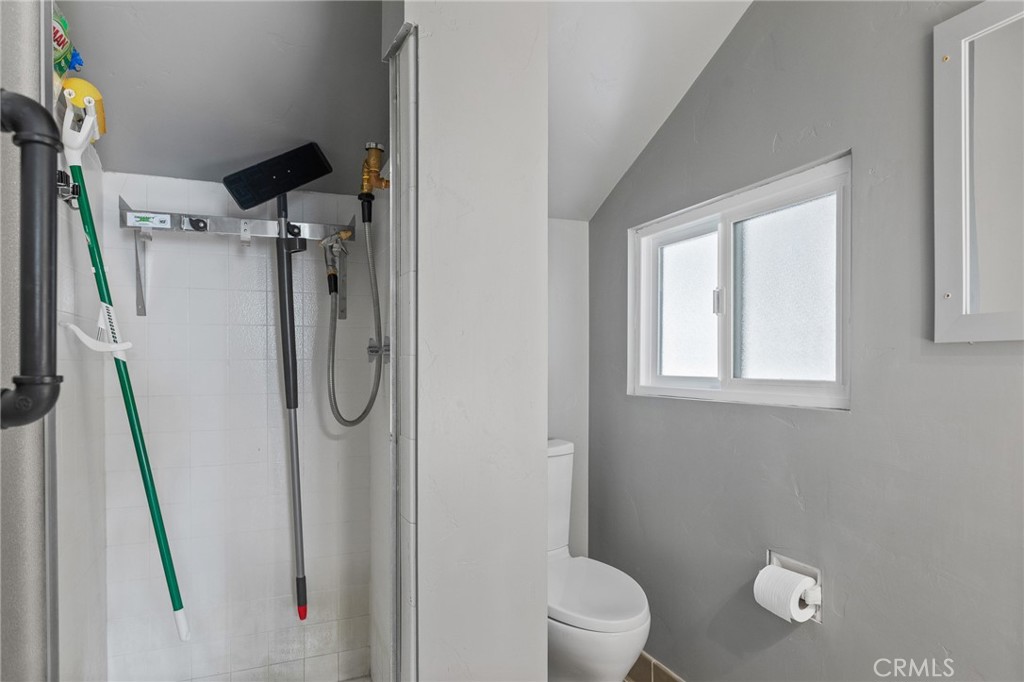 28670 Highway 18 Lake Arrowhead, CA 92385 - Photo 16 of 24 a bathroom with a shower toilet and sink