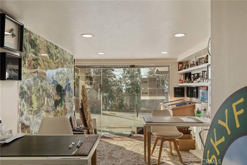 28670 Highway 18 Lake Arrowhead, CA 92385 - Photo 22 of 24 a room with furniture and a window