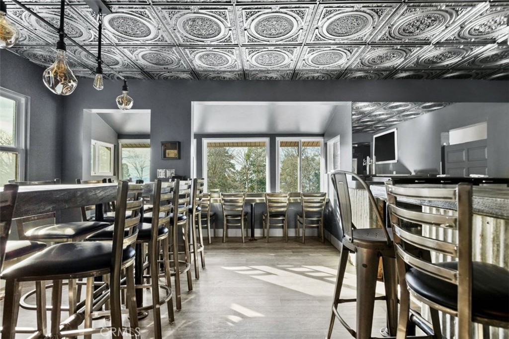 28670 Highway 18 Lake Arrowhead, CA 92385 - Photo 3 of 24 a view of a dining area with furniture