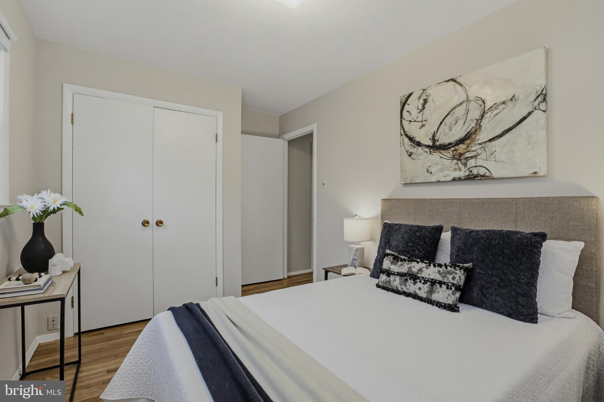 404 Ritchie Parkway Rockville, MD 20852 - Photo 20 of 38 a bedroom with a bed and cabinets