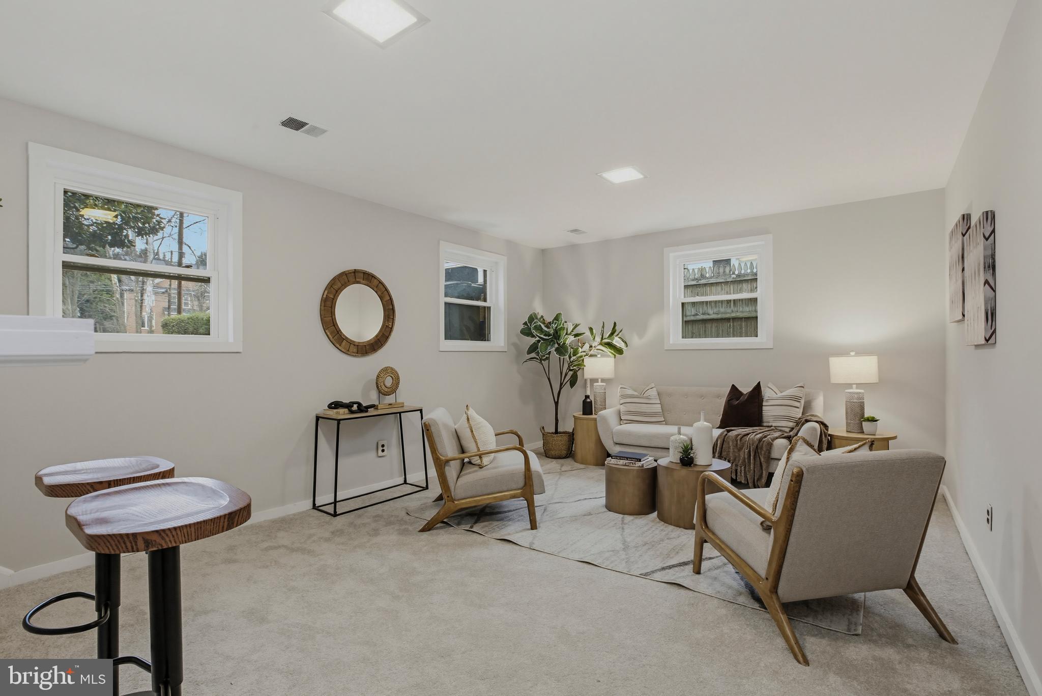 404 Ritchie Parkway Rockville, MD 20852 - Photo 23 of 38 a living room with furniture and a potted plant