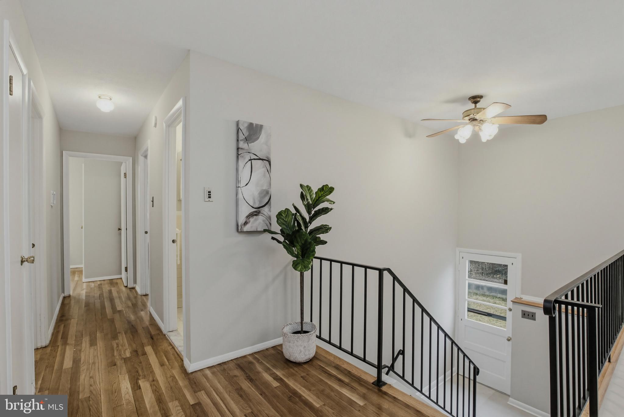 404 Ritchie Parkway Rockville, MD 20852 - Photo 10 of 38 a view of a hallway with wooden floor