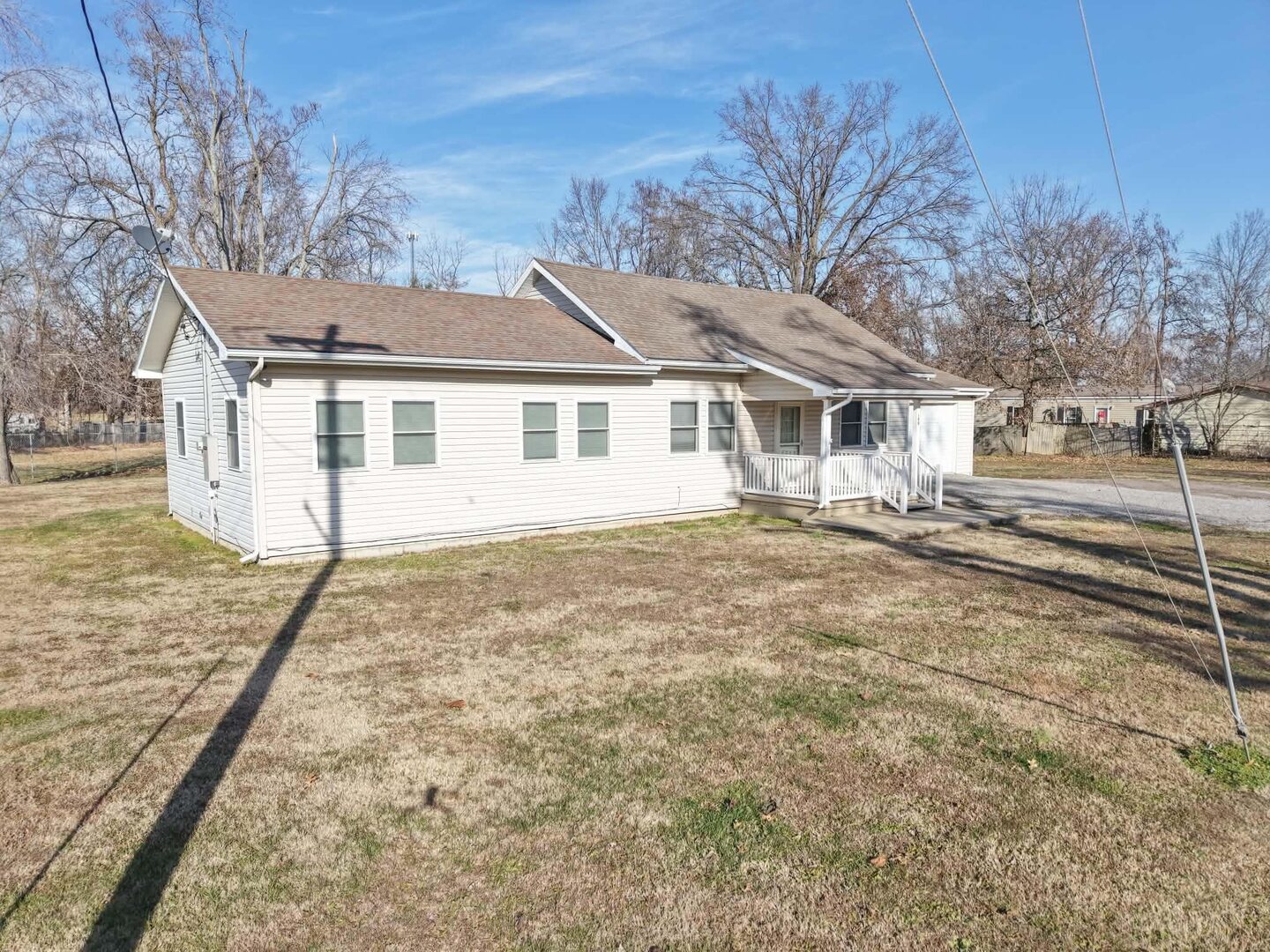 190 Public Street Muddy, IL 62965 - Photo 14 of 16 a house with trees in the background