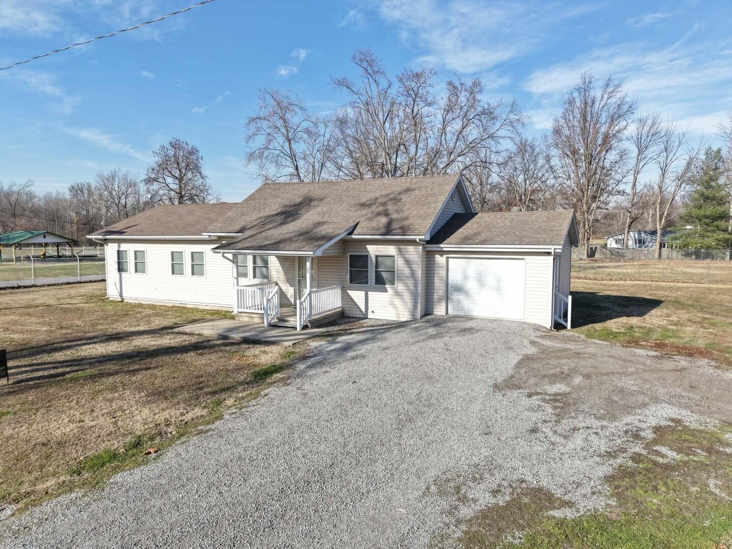 190 Public Street Muddy, IL 62965 - Photo 15 of 16 a view of a house with a yard and large tree
