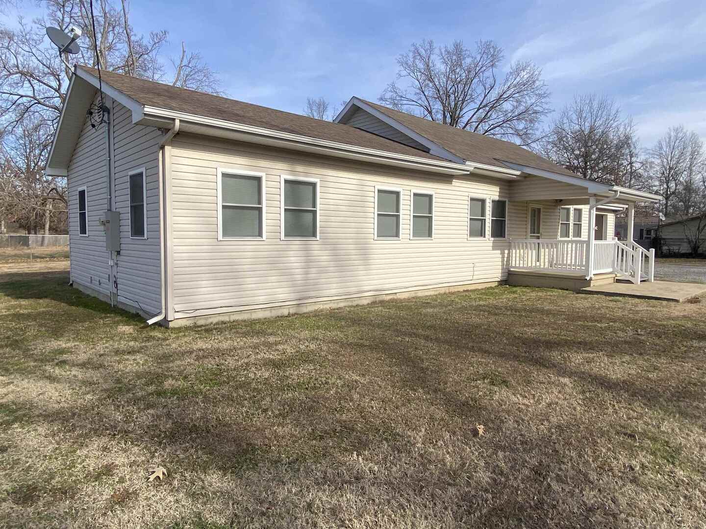 190 Public Street Muddy, IL 62965 - Photo 5 of 16 a front view of a house with a garden