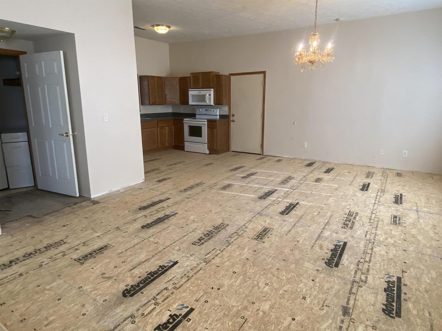 190 Public Street Muddy, IL 62965 - Photo 7 of 16 a view of kitchen and empty room