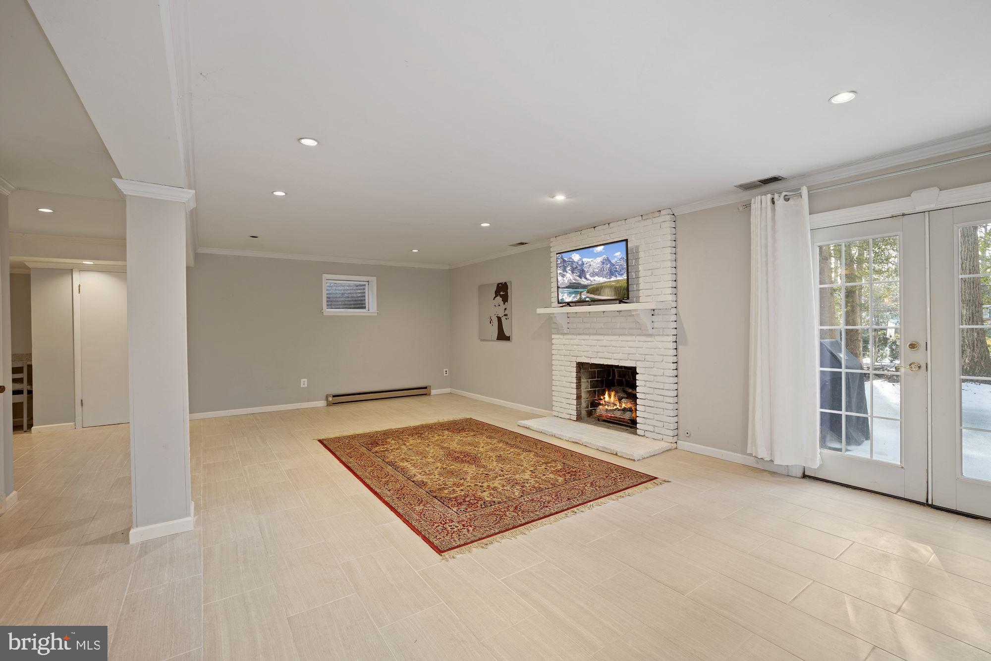 8500 Brook Road McLean, VA 22102 - Photo 36 of 44 Walkout Lower Level Recreation Room