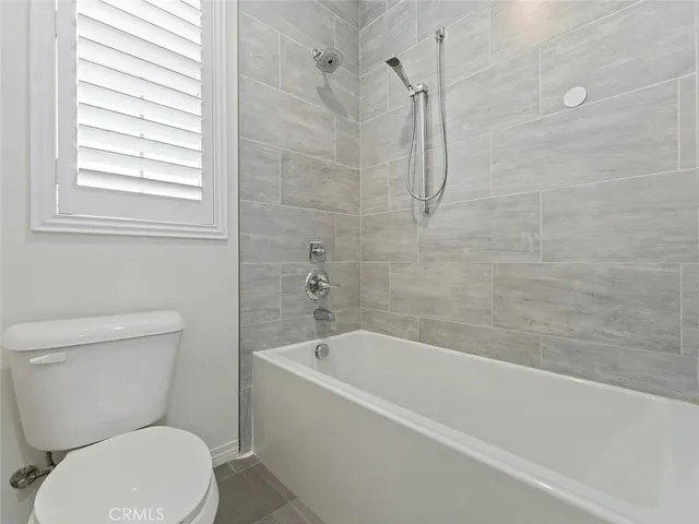 an empty room with closet area