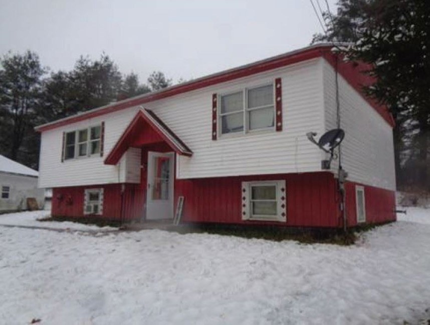 23 Stone Valley Road Orange, MA 01364 - Photo 1 of 3 a view of a house with a yard