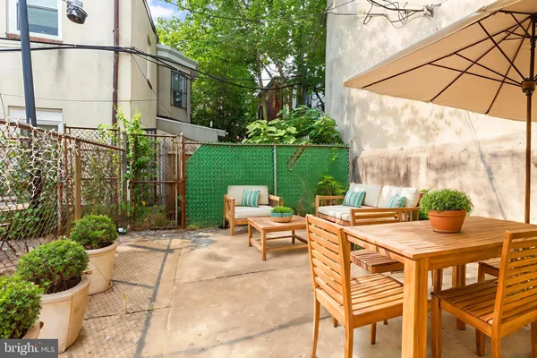 a view of an outdoor sitting area with a table
