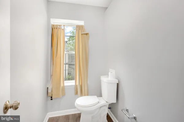 a bathroom with a toilet and a sink