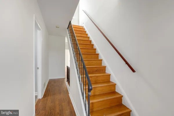 a view of entryway with wooden floor