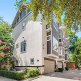 a front view of a multi story residential apartment buildings