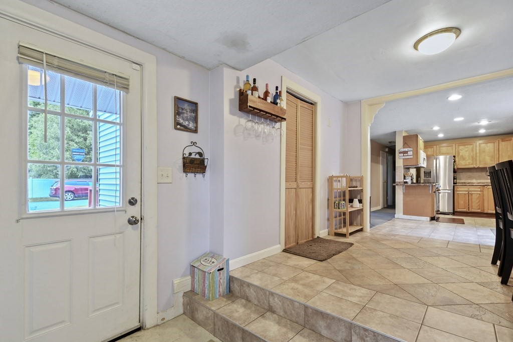 22 Ox Road Billerica, MA 01821 - Photo 12 of 26 a bedroom with a bed and a large window