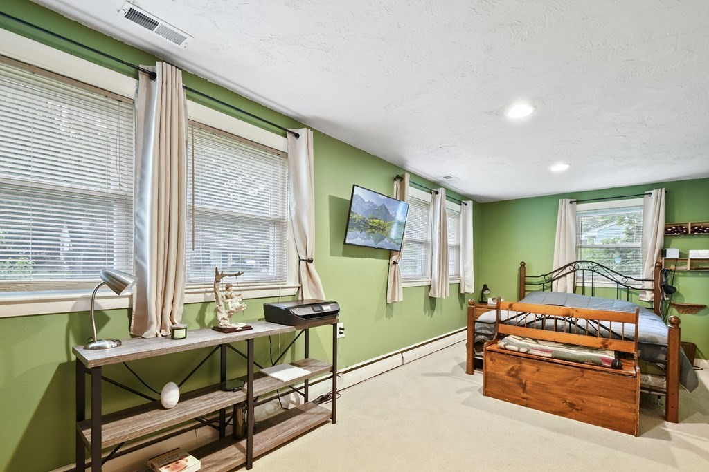 22 Ox Road Billerica, MA 01821 - Photo 16 of 26 a bedroom with furniture and a large window