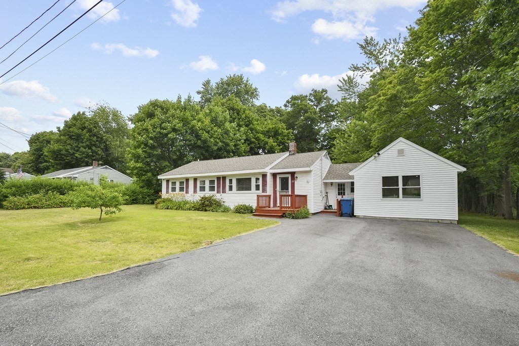 22 Ox Road Billerica, MA 01821 - Photo 22 of 26 a view of house with outdoor space and trees in the background