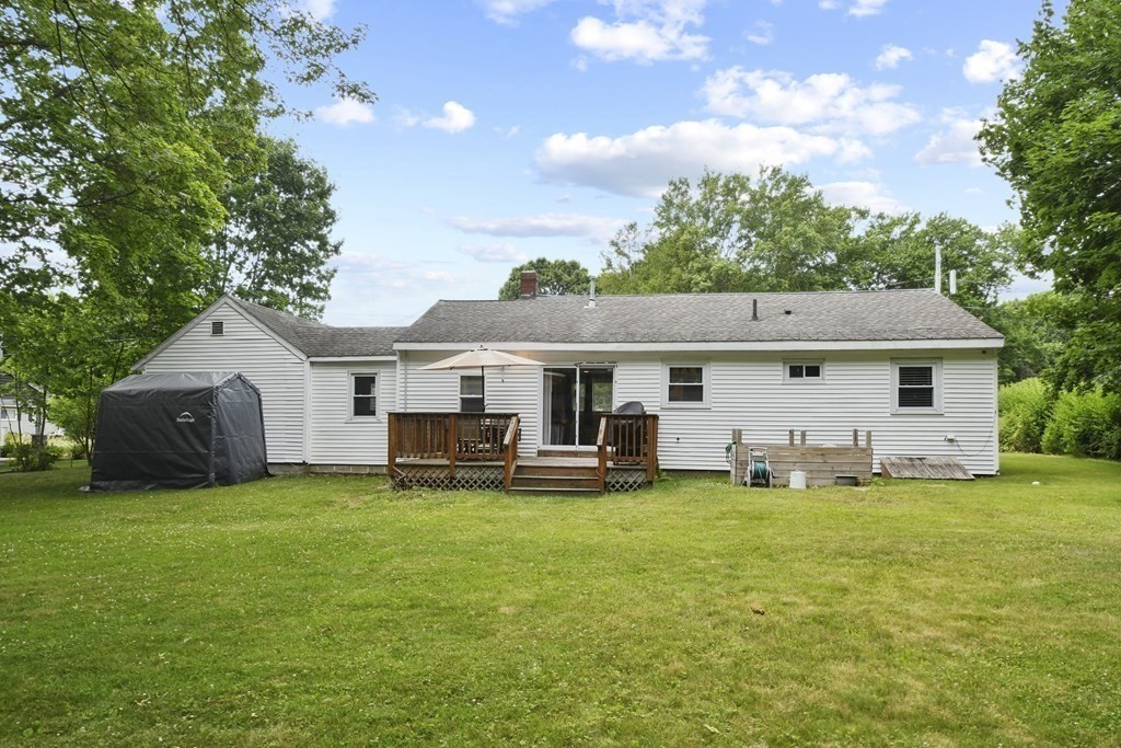 22 Ox Road Billerica, MA 01821 - Photo 23 of 26 a view of a house with a yard and sitting area