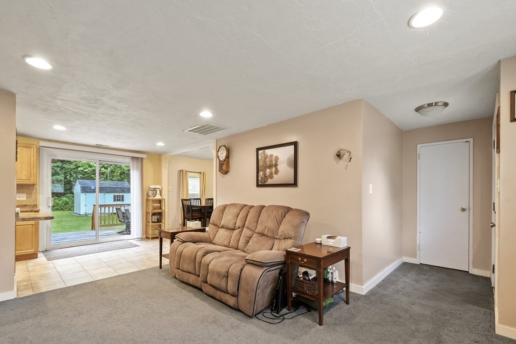 22 Ox Road Billerica, MA 01821 - Photo 9 of 26 a living room with furniture and a large window