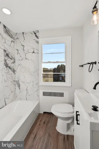 a bathroom with a sink and a toilet