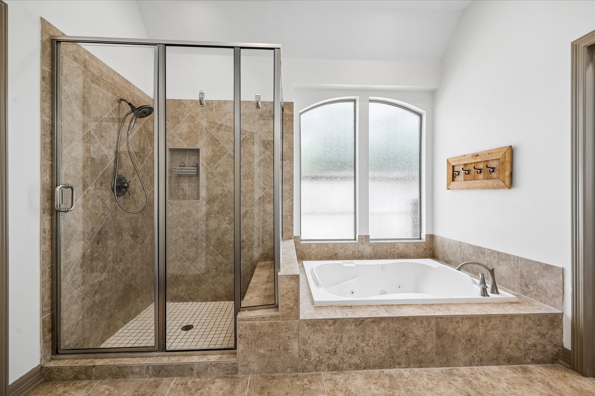 28211 Rippling Brook Lane Fulshear, TX 77441 - Photo 20 of 45 a bathroom with a granite countertop bathtub shower and a sink