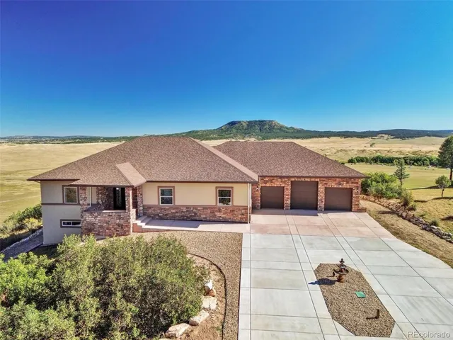 front view of house with a yard
