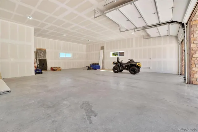an aerial view of a house with a garden