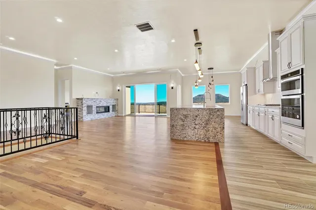 a lobby with furniture and wooden floor