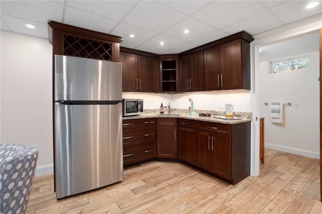 2197 Middle Road East Greenwich, RI 02818 - Photo 25 of 38 Lower level kitchenette with refrigerator, sink and microwave