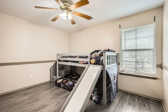 a kitchen with a stove and a chandelier