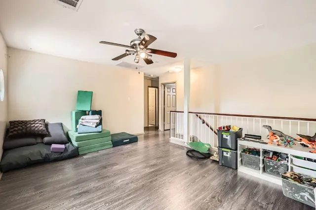 a view of workspace with wooden floor