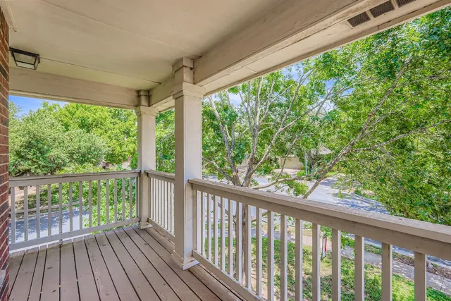 a view of washer and dryer with kitchen countertops