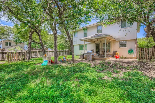 a view of a patio with furniture