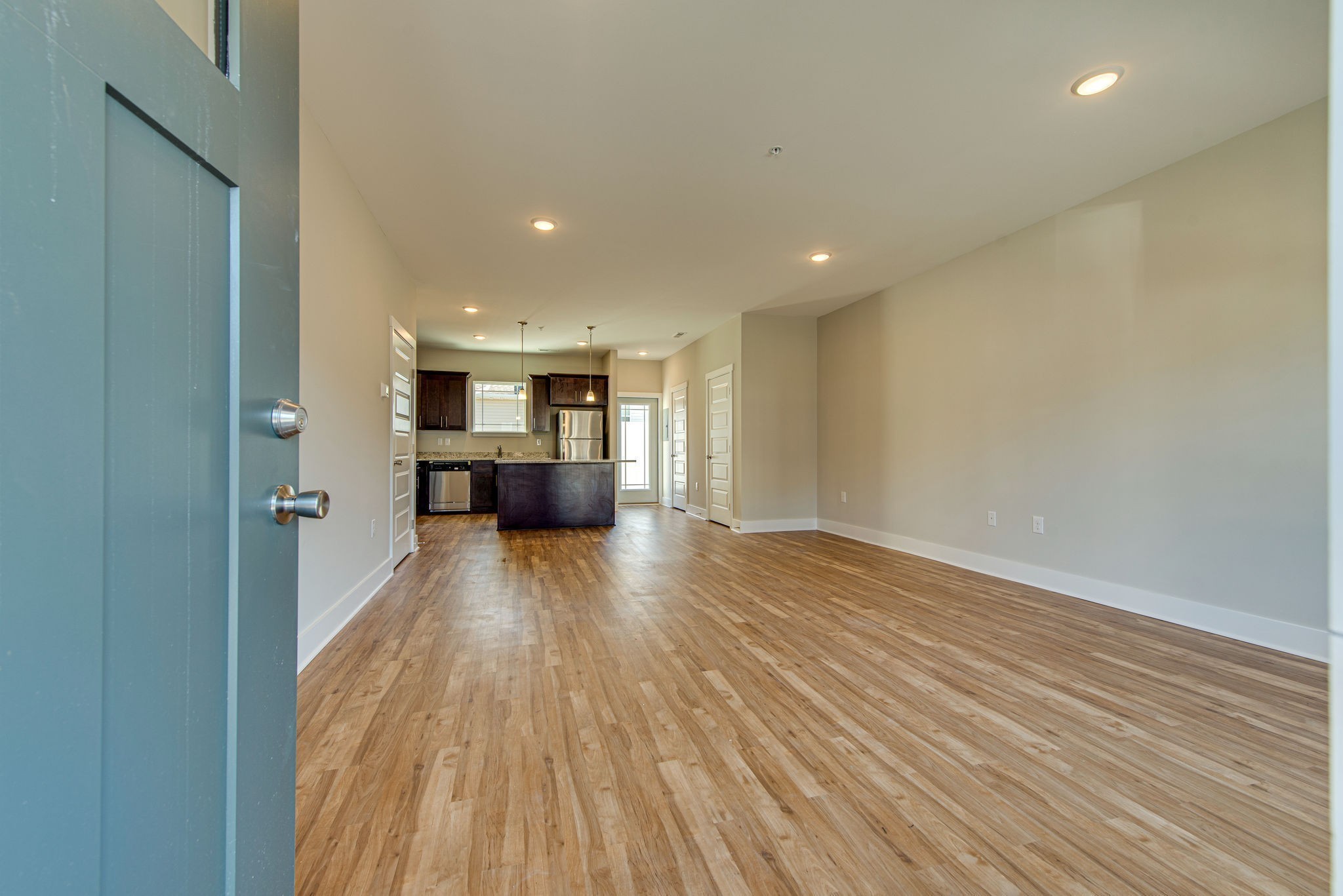 3010 Coriander Dr Spring Hill Spring Hill, TN 37174 - Photo 14 of 37 a view of a big room with wooden floor and windows