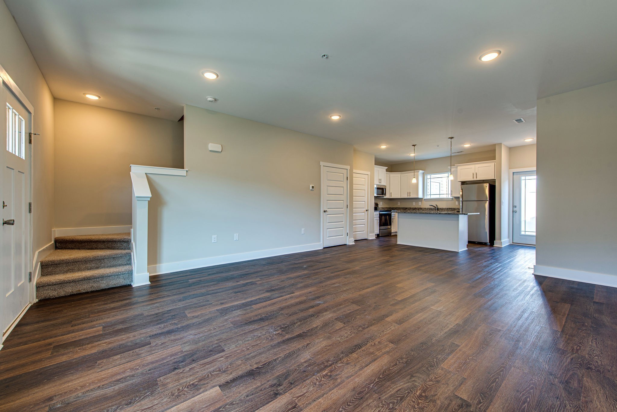 3010 Coriander Dr Spring Hill Spring Hill, TN 37174 - Photo 19 of 37 a view of kitchen with wooden floor and electronic appliances