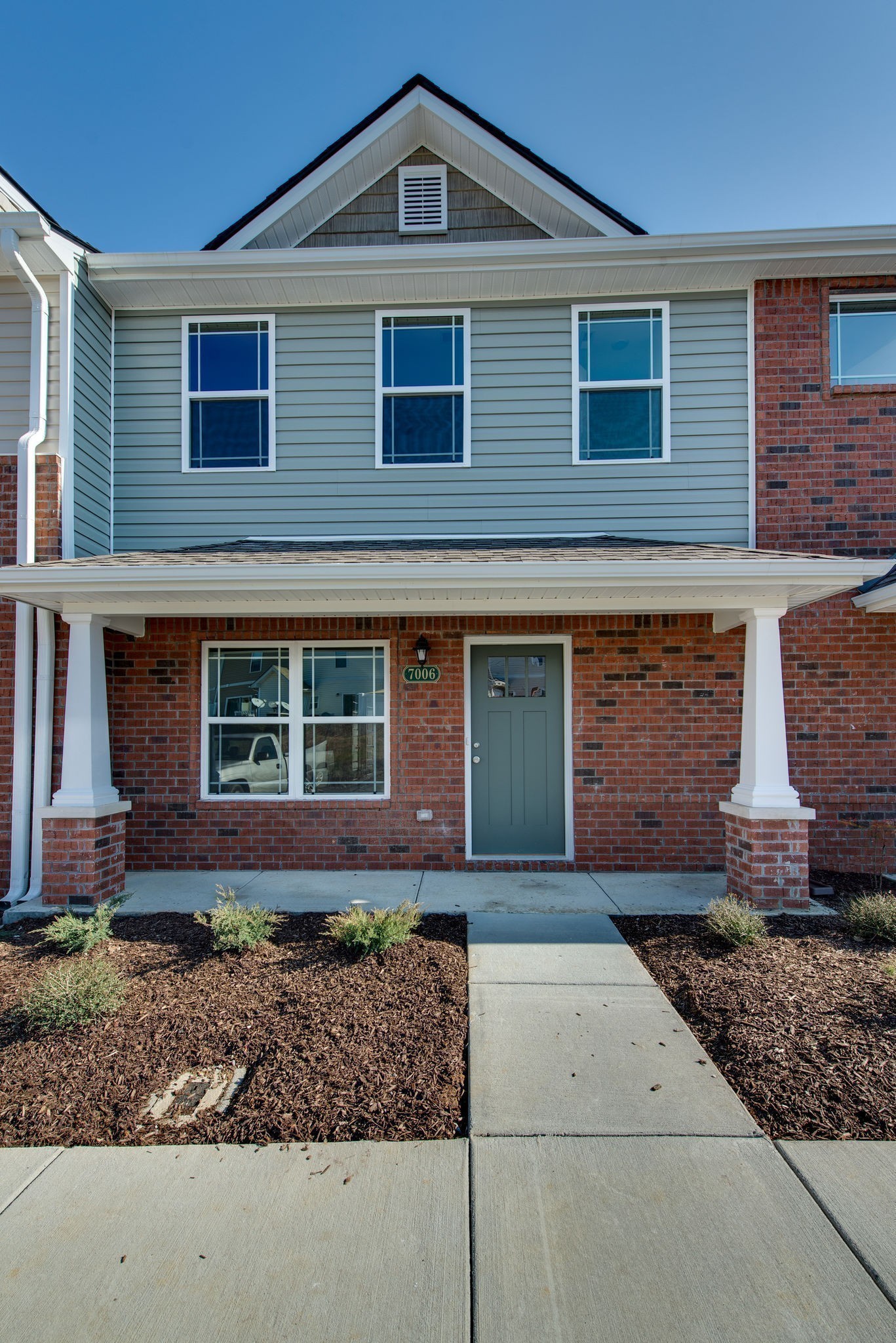 3010 Coriander Dr Spring Hill Spring Hill, TN 37174 - Photo 3 of 37 a front view of a house with garden
