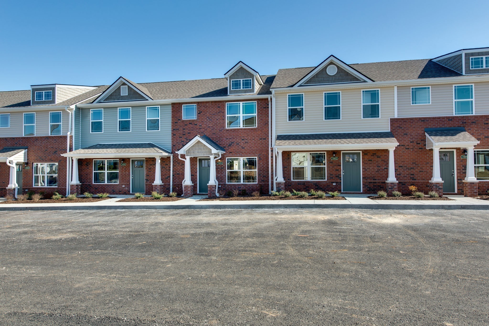 3010 Coriander Dr Spring Hill Spring Hill, TN 37174 - Photo 33 of 37 a front view of a building with many windows