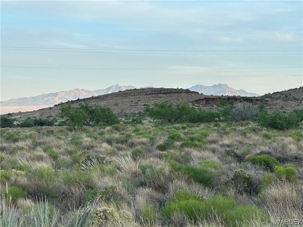 0 Stockton Hill Road Kingman, AZ 86409 - Photo 17 of 20 a view of a mountain in the distance in a field