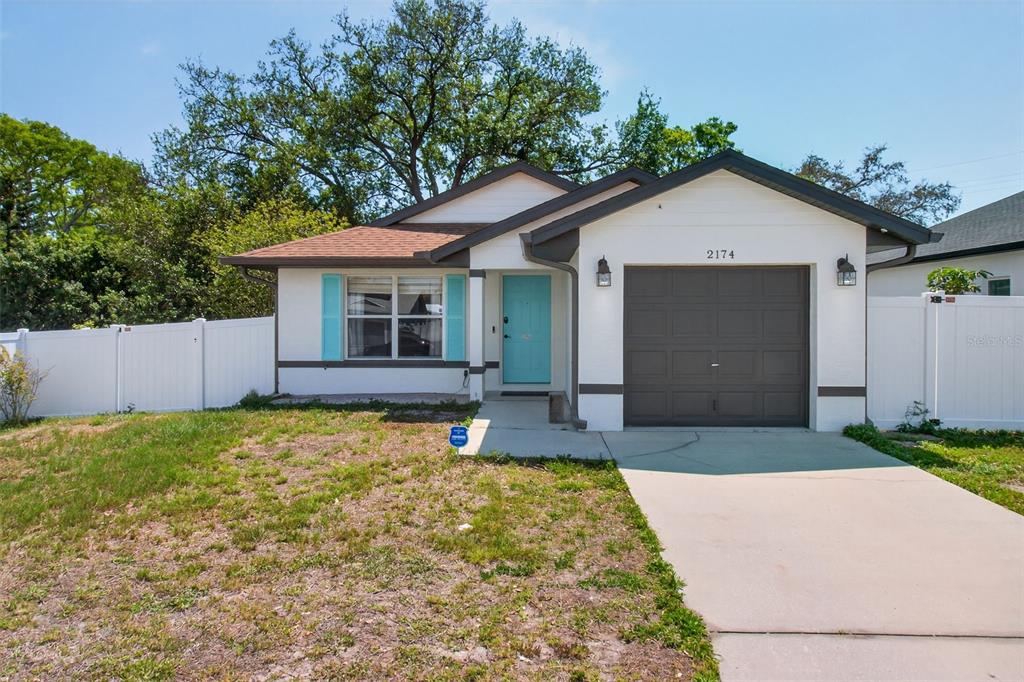 a house view with a garden space