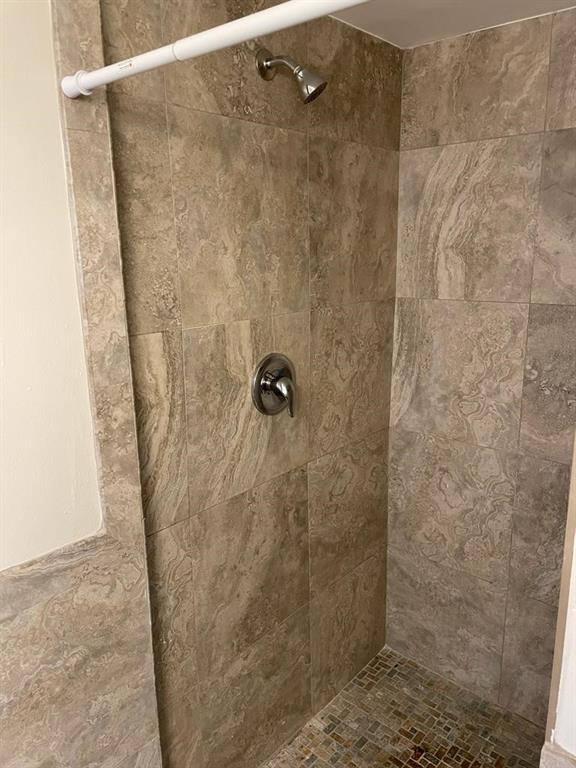 2481 Southwest 82nd Avenue, Unit 101 Davie, FL 33324 - Photo 12 of 14 a bathroom with a shower