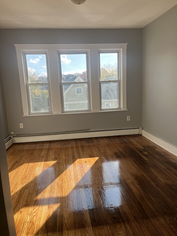 52 Mascot Street, Unit 6 Boston, MA 02124 - Photo 2 of 12 a view of a bathtub in a room